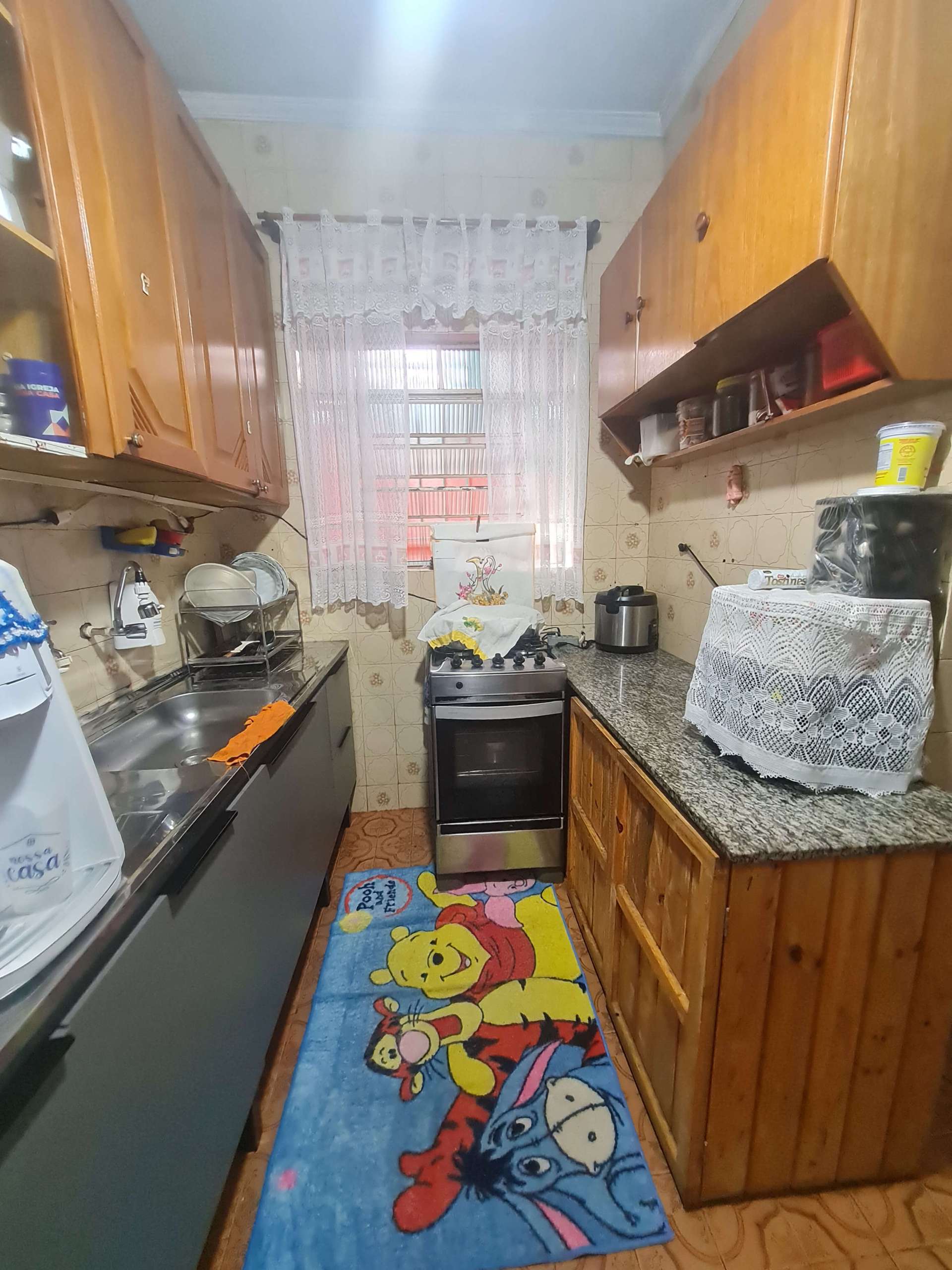 Casa da frente, cozinha.